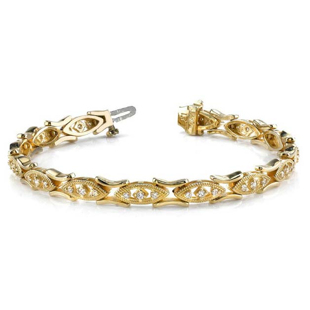 14K yellow gold milgrain detailed tennis bracelet. Try this on in white gold or two-tone!!!