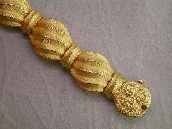 A solid 24" gold bracelet from the Middle East.