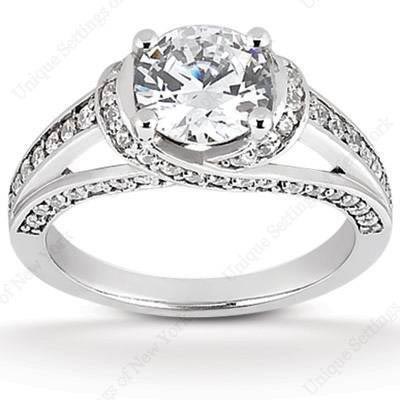 14K white gold engagement ring with round diamond center.